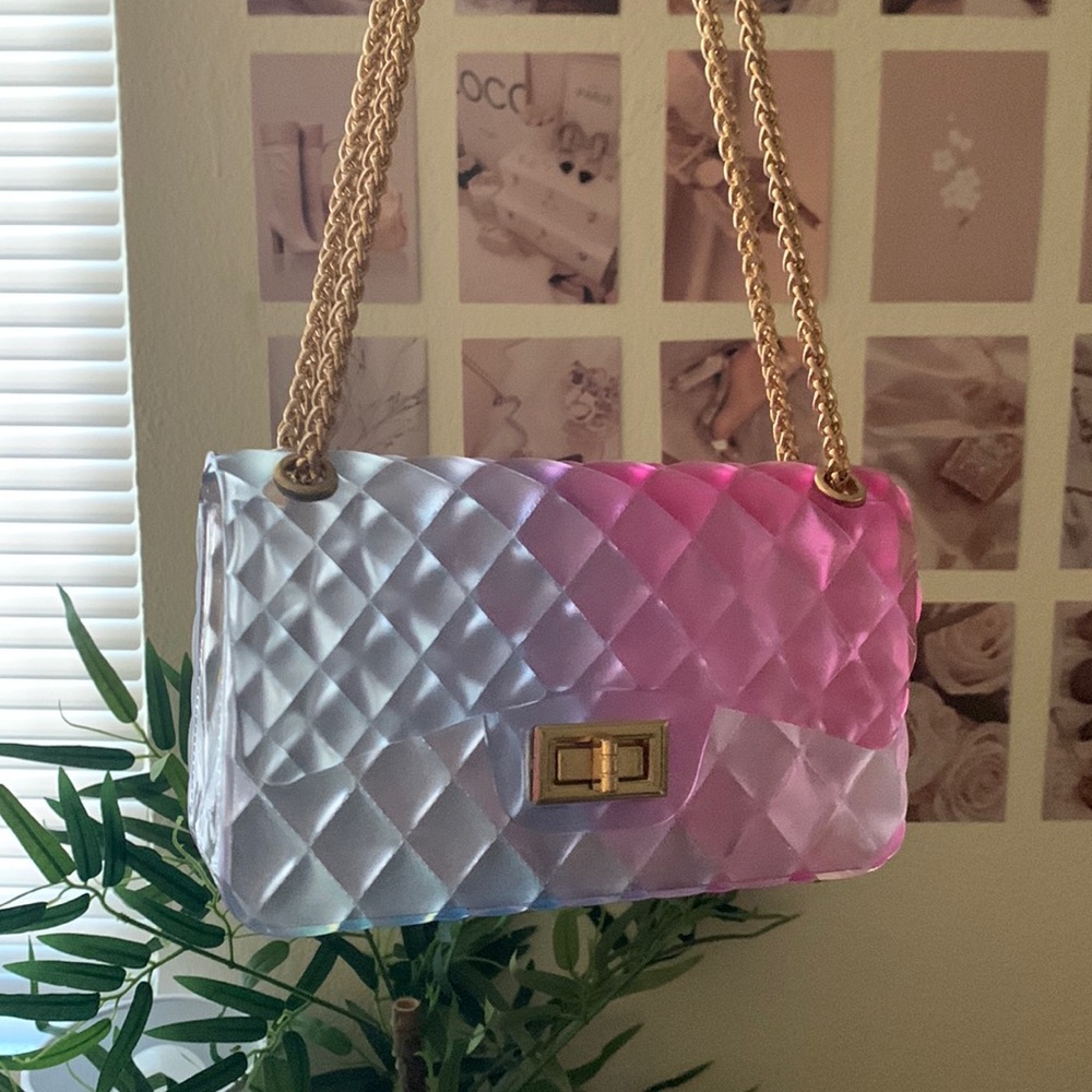 I am selling a blue and pink ombré shoulder bag.